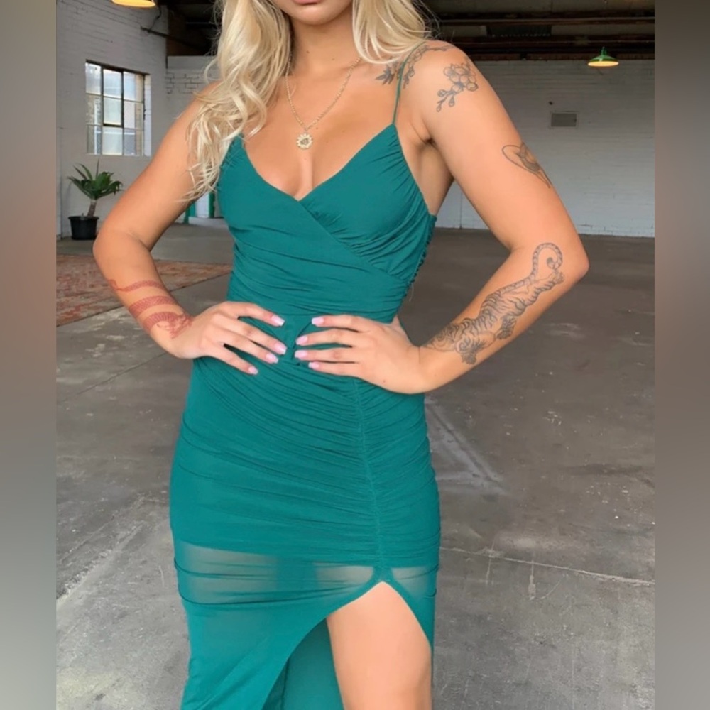 THATS SO FETCH. Emerald formal dress with slit and mesh. Us size 6.